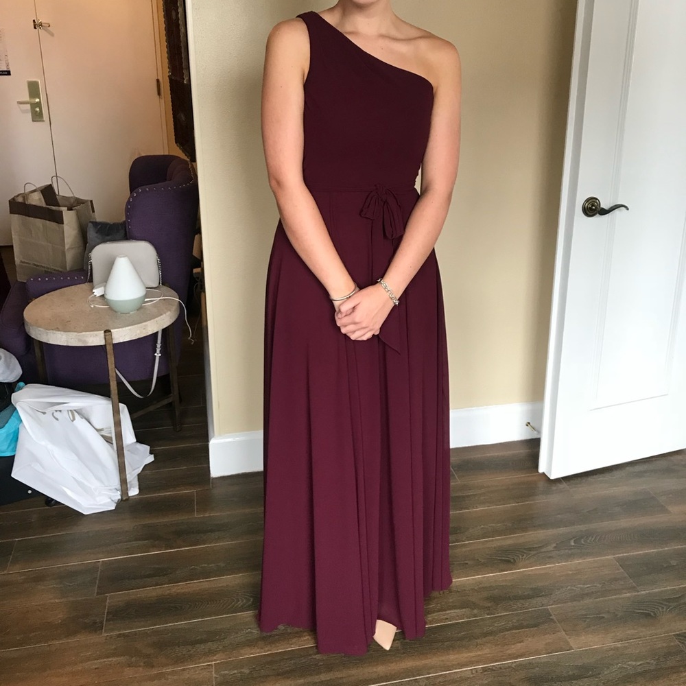 Selling long burgundy formal dress. Worn once. Has been dry cleaned.